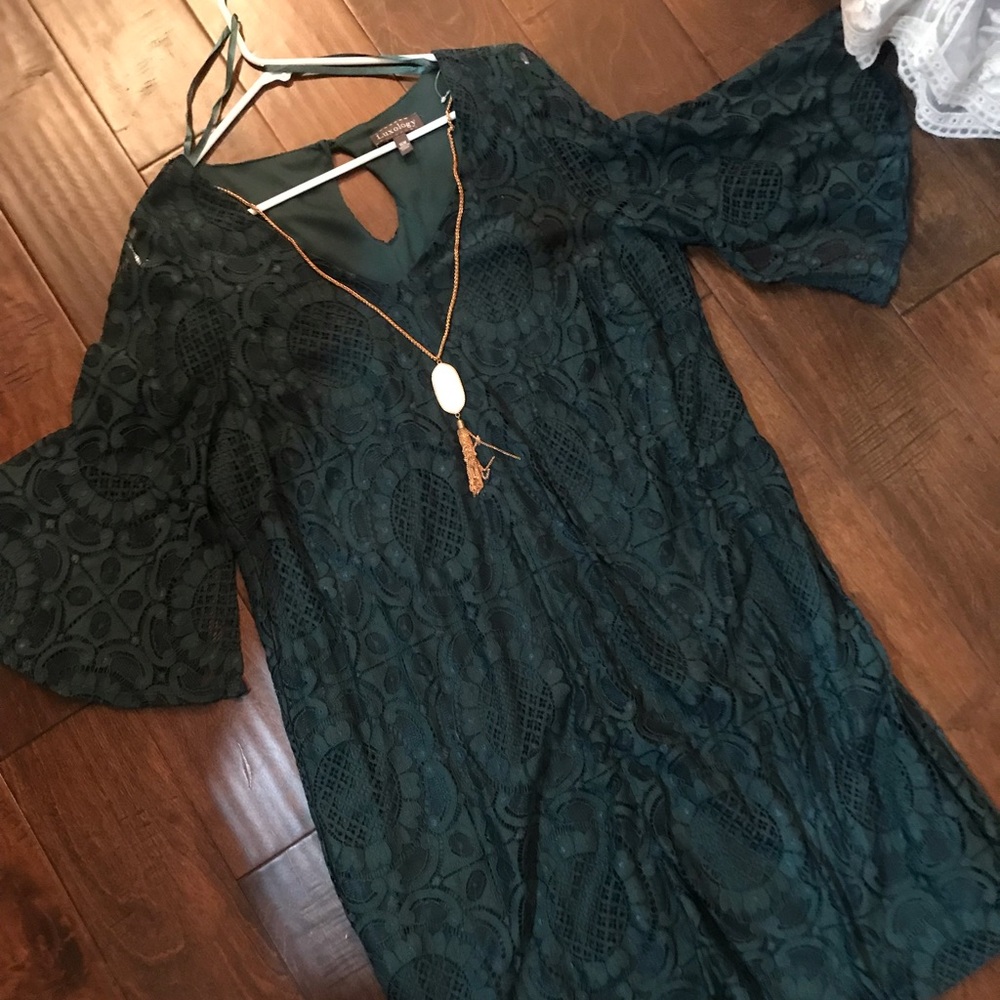Forest green lace dress with opal necklace